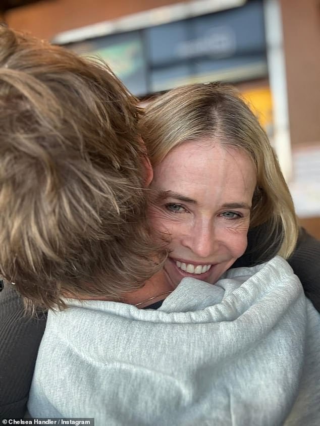 However, the most interesting thing from the slideshow were photos of her cuddled up with a hunky new mystery man