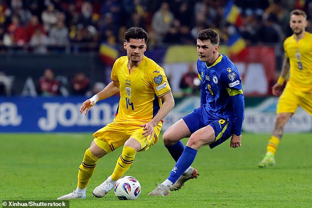 The bizarre claim was made by Bosnia boss Sergej Barbarez, who suggested Welshman Cooper deliberately sidelined Benjamin Tahirovic (right) ahead of the World Cup play-offs