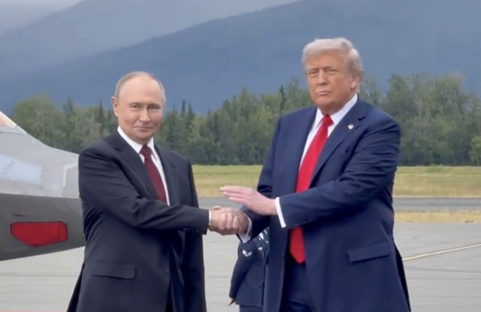 Russian President Putin and President Trump during a meeting in Alaska last spring-image from White House video