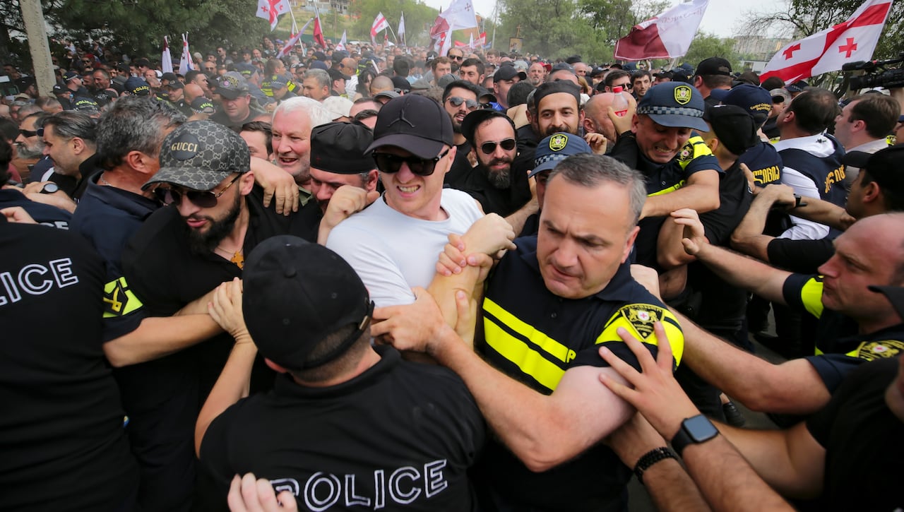 Police block opponents of gay rights at a pride event