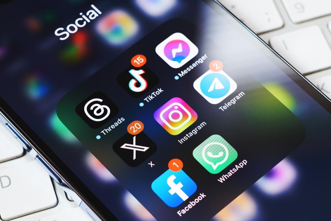 Social media applications including X, TikTok, Instagram, Facebook, Threads, Messenger, Telegram, and WhatsApp are displayed on a smartphone screen in Moscow, Russia, July 29, 2023. (Adobe Stock Photo)