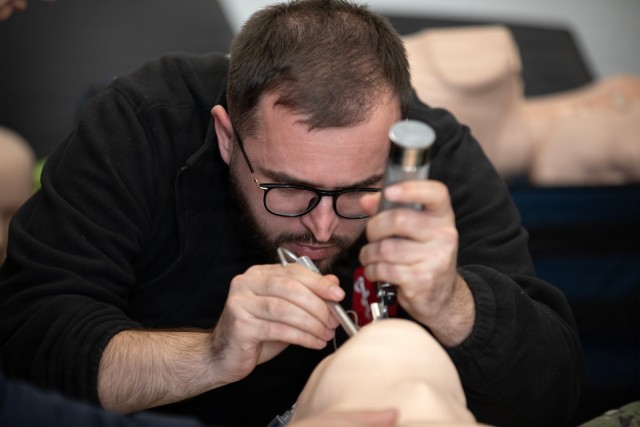 U.S. Army National Guard medics strengthen local clinic with lifesaving training