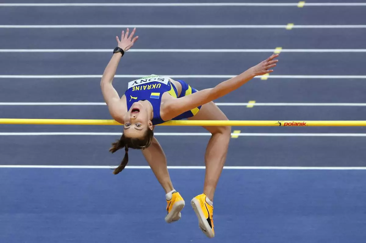 Yaroslava Mahuchikh, of Ukraine, makes an attempt in the women's high jump final at the World Athletics Indoor Championships in Torun, Poland, Friday, March 20, 2026. (AP Photo/Beata Zawrzel)