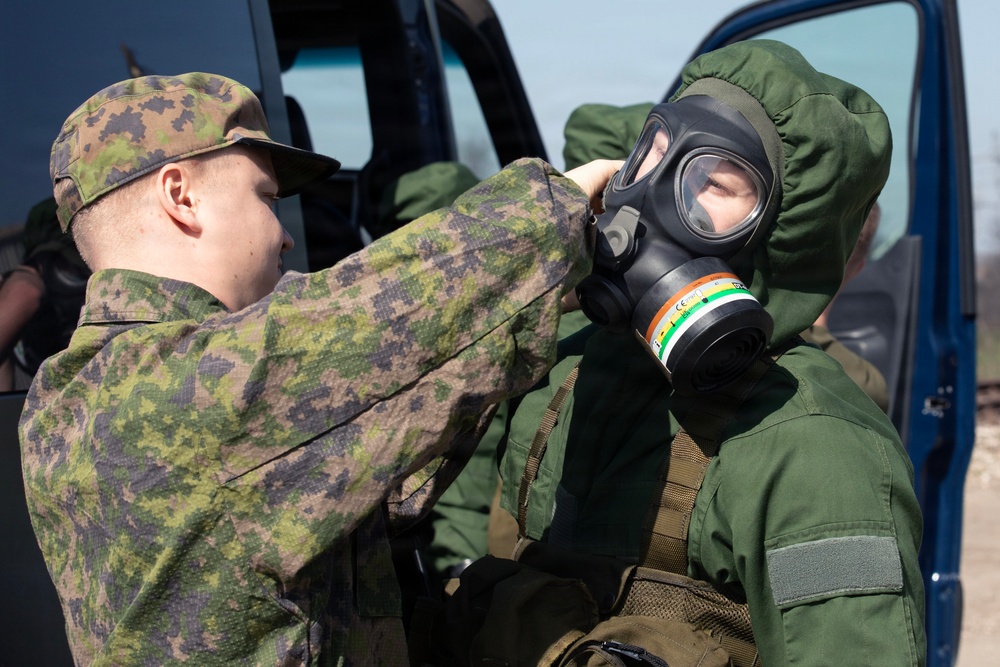 Finnish CBRN engineers inspect hazardous materials in support of KFOR