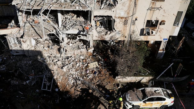 Iran targets Israel and Gulf Arab states even as Trump says U.S. is in talks to end war