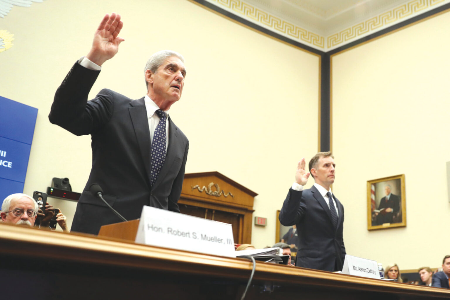 Former special counsel Robert Mueller, accompanied by his top aide in the investigation Aaron Zebley, right, are sworn in before testifying before the House Intelligence Committee hearing on his report on Russian election interference, on Capitol Hill, in Washington, Wednesday, July 24, 2019.Mueller died March 19, 2026, according to his family.
