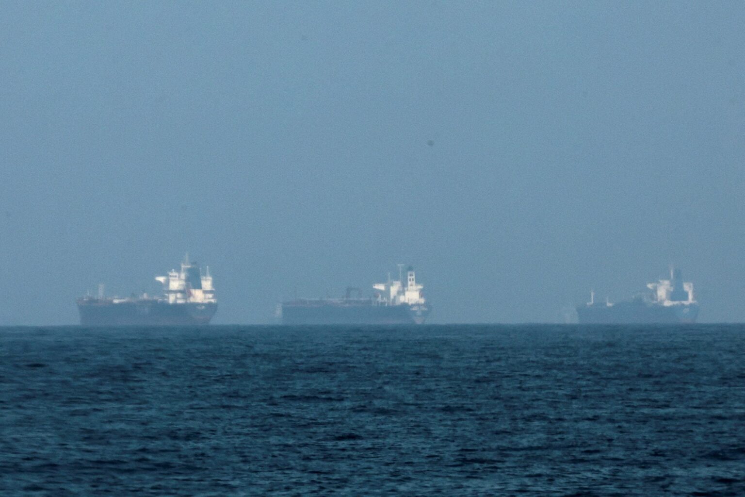 FILE PHOTO: Tankers are seen off the coast of the Fujairah, as Iran vows to close the Strait of Hormuz