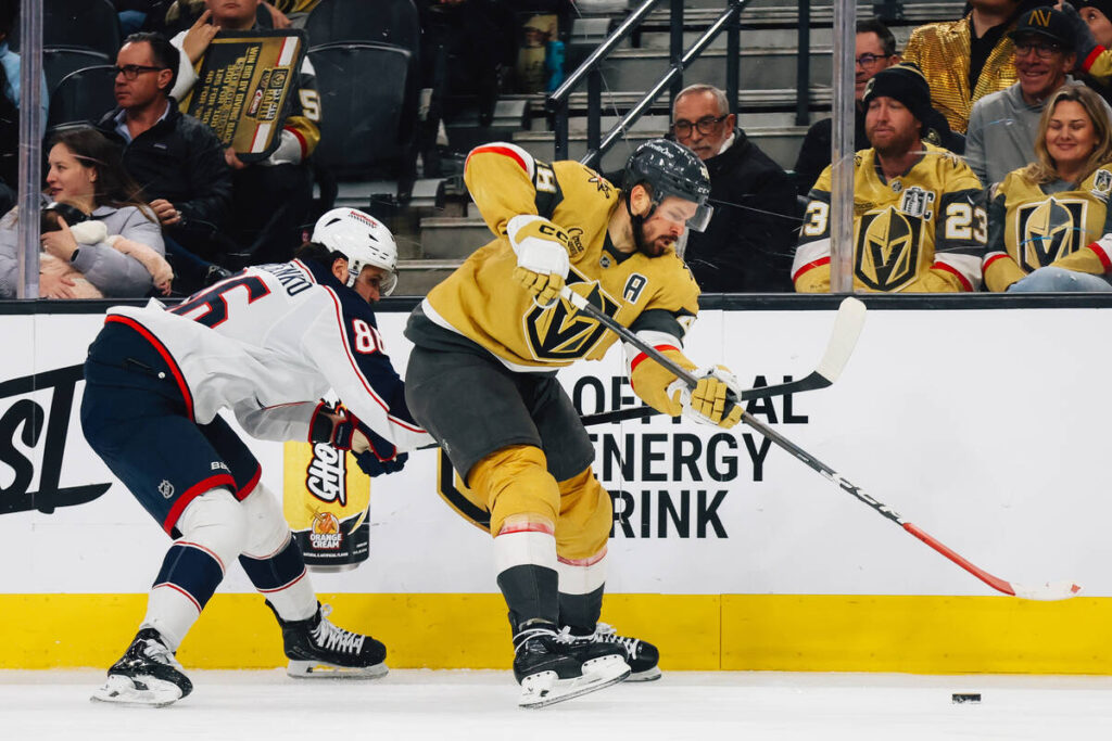Golden Knights center Tomas Hertl (48) and Columbus Blue Jackets right wing Kirill Marchenko (8 ...
