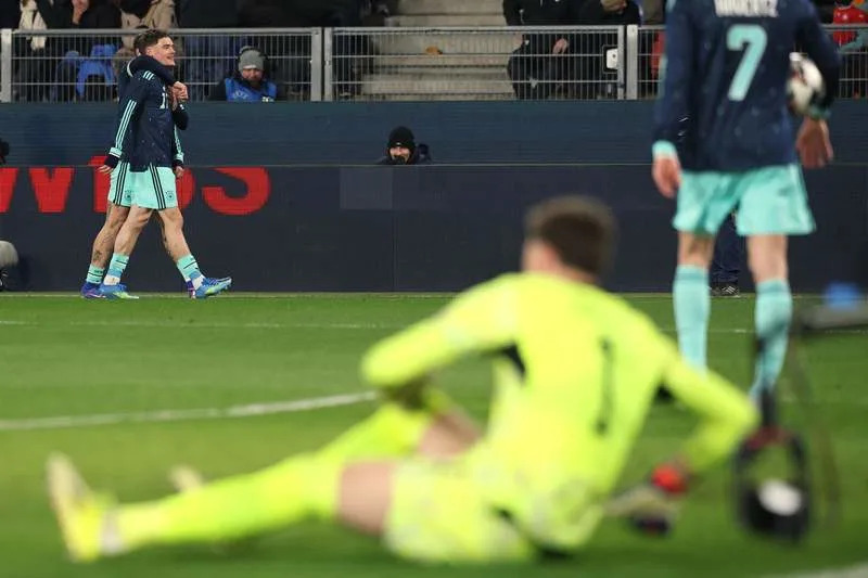Germany's Florian Wirtz celebrates his side's third goal of the game during the International Friendly soccer match between Switzerland and Germany at St. Jakob Park. Christian Charisius/dpa