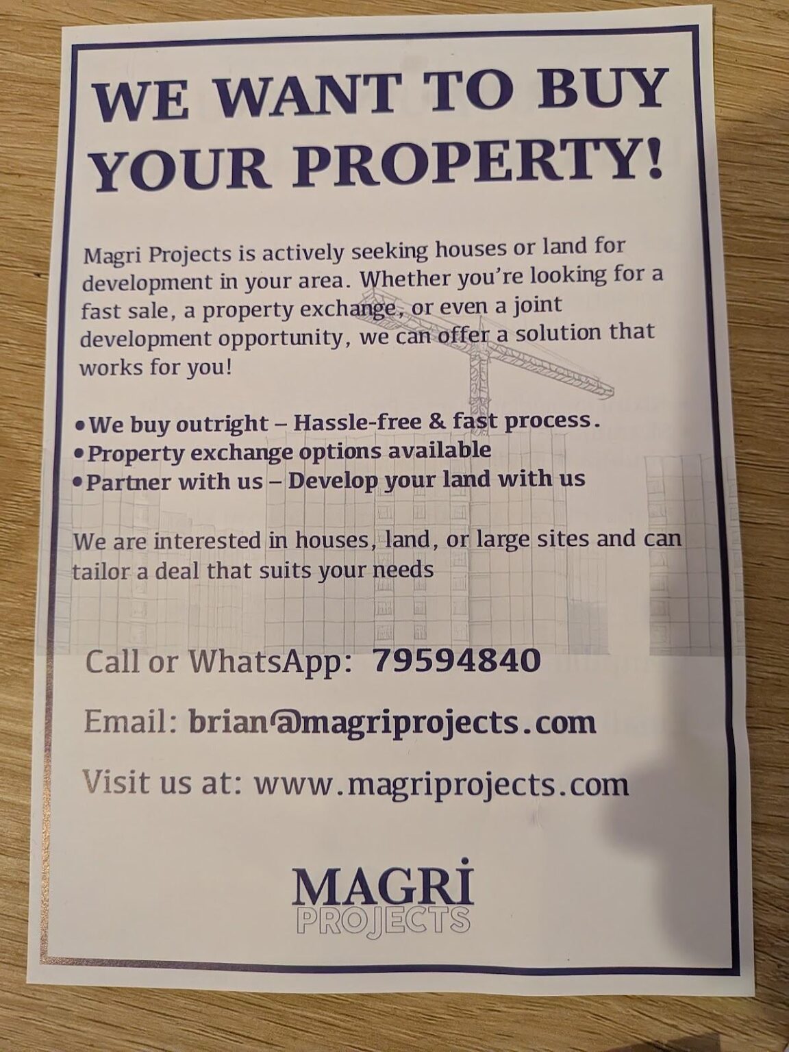 Receiving this in the mail while they’re developing the field on our street is bad enough—but did they really have to put the crane on the flyer?