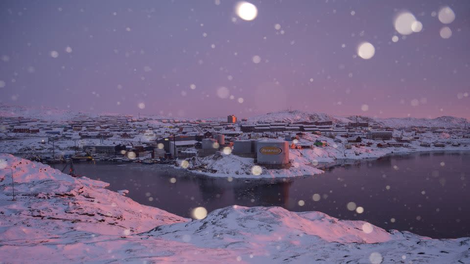 Snow falls over the city of Ilulissat, Greenland - Florent Vergnes/AFP/Getty Images