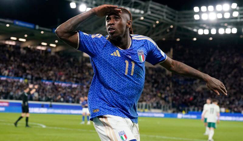 Italy's Moise Kean celebrates scoring their second goal.