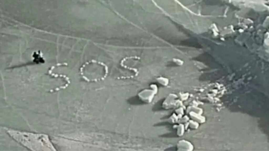 Stranded skiers use ice chunks to spell out ‘SOS’ Stranded skiers use ice chunks to spell out 'SOS'