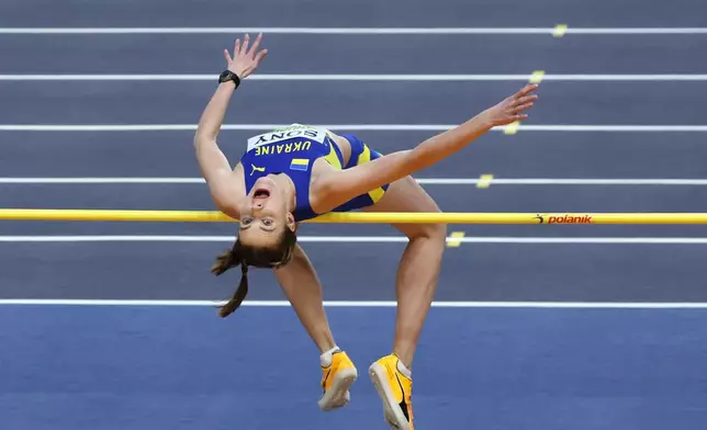 Yaroslava Mahuchikh, of Ukraine, makes an attempt in the women's high jump final at the World Athletics Indoor Championships in Torun, Poland, Friday, March 20, 2026. (AP Photo/Beata Zawrzel)