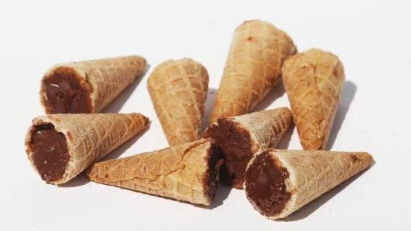 Which ice creams sold in our stores have chocolate at the end of the cone?