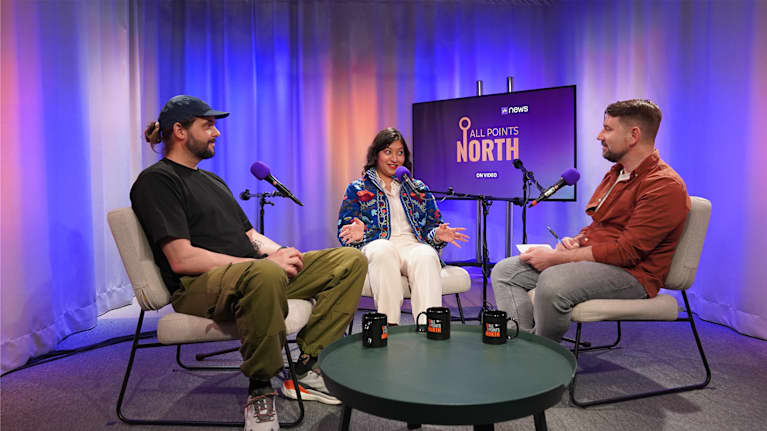 Photo shows Pieter den Heten, Megha Goswami and Yle News journalist Ronan Browne in the All Points North studio.