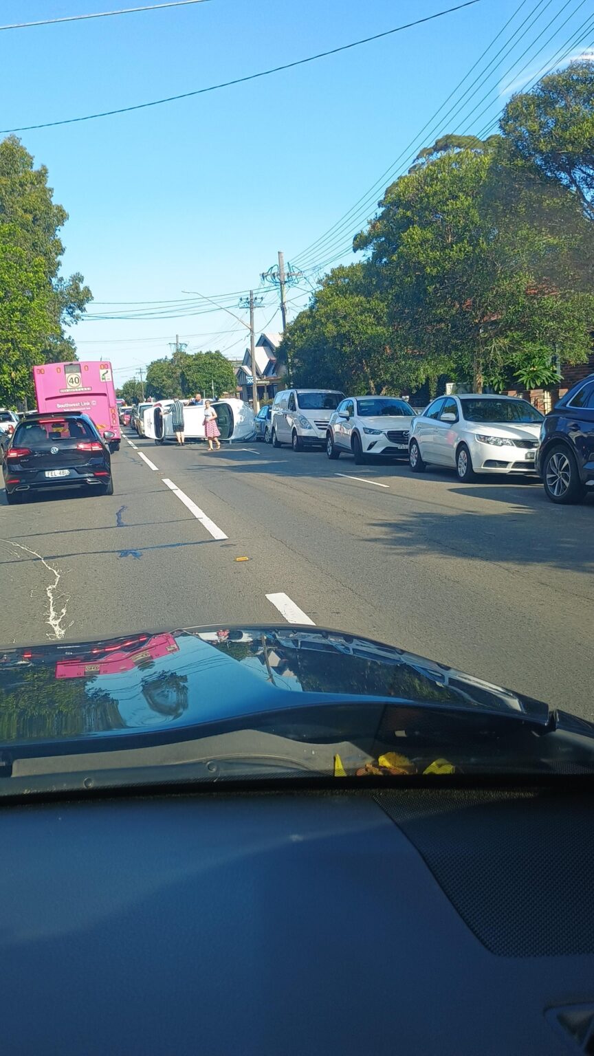 Car flipped Sydenham Rd, Sydenham