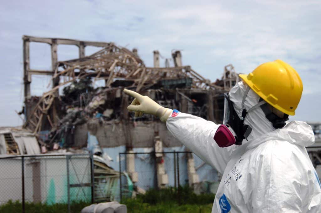 IAEA fact-finding team leader Mike Weightman examines Reactor Unit 3 at the Fukushima Daiichi Nuclear Power Plant on 27 May 2011 to assess tsunami damage and study nuclear safety lessons that could be learned from the accident. Photo Credit: Greg Webb / IAEA (IAEA Imagebank/Flickr)