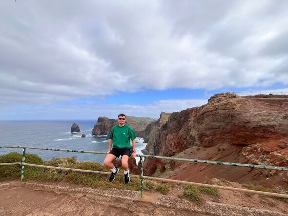 Paul McAuley against the backdrop of Canical, Machico