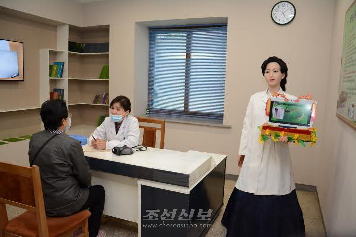 An AI-powered robot operates inside a pharmacy in Pyongyang, as reported by the pro-North Korea newspaper Choson Sinbo on July 21, 2025. [YONHAP]