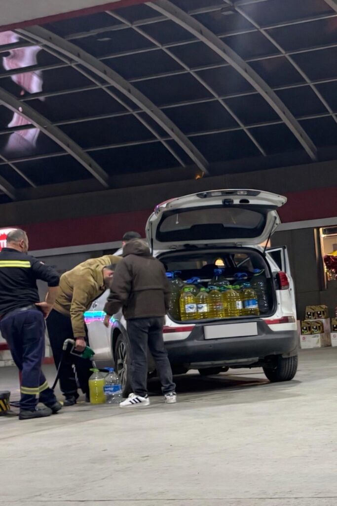 Some citizens, who took action in anticipation of the price hike, flock to the stations and buy fuel in canisters.