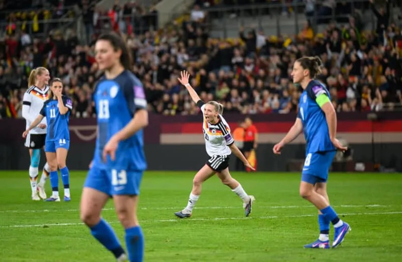 Germany's Elisa Senss celebrates scoring her side's second goal during the 2027 FIFA Women's World Cup qualifier League A, Group D, soccer match between Germany and Slovenia at the Rudolf-Harbig-Stadion Robert Michael/dpa