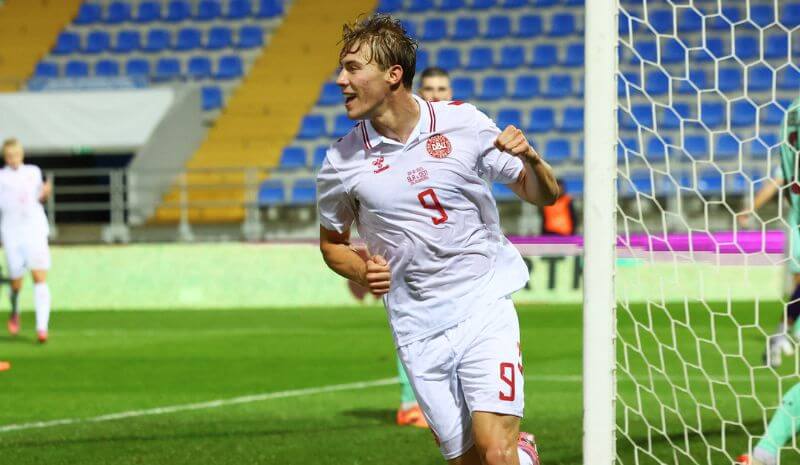 Denmark's Rasmus Hojlund celebrates scoring their third goal.