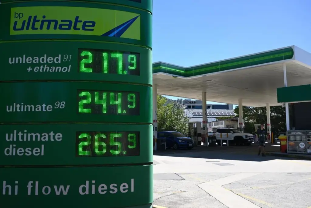 epa12815976 Fuel prices are displayed at a petrol station in Canberra, Australia, 13 March 2026. The sign shows current rates as motorists monitor fuel costs.  EPA/LUKAS COCH AUSTRALIA AND NEW ZEALAND OUT