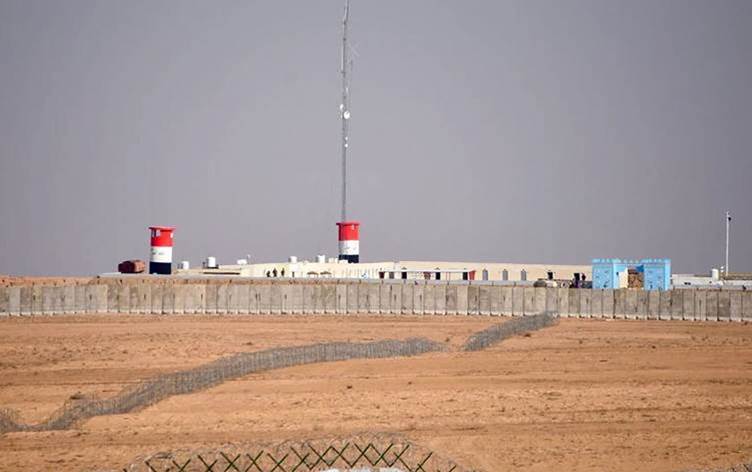 Iraq says arrested four in connection with rocket...