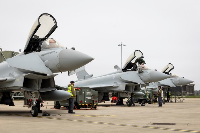 British military jets are lined up preparing to deploy to the Middle East.