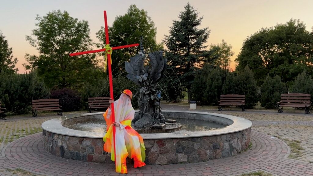 Aglaja Ray, Still from the performance video “The walk in Silence”, 2023. Tauragė, Lithuania. Contemporary Art Festival “KVADRATU”. Courtesy of the artist