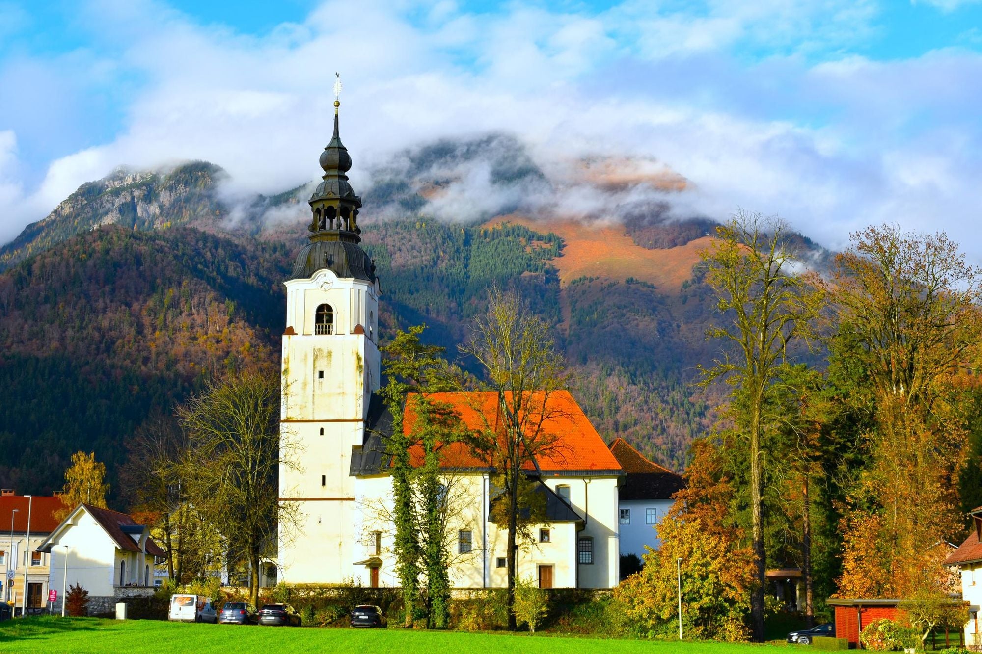 A church in the village of Preddvor and Srednji vrh mountain in Gorenjska, Slovenia. Photo: Getty