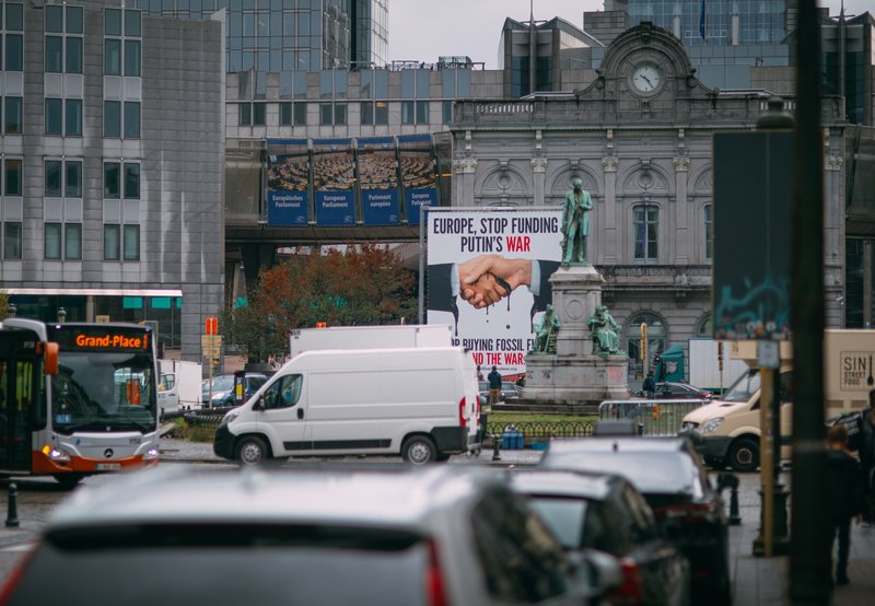 billboard in brussels, belgium, calling on eu countries to stop buying russian oil and gas after ukraine invasion