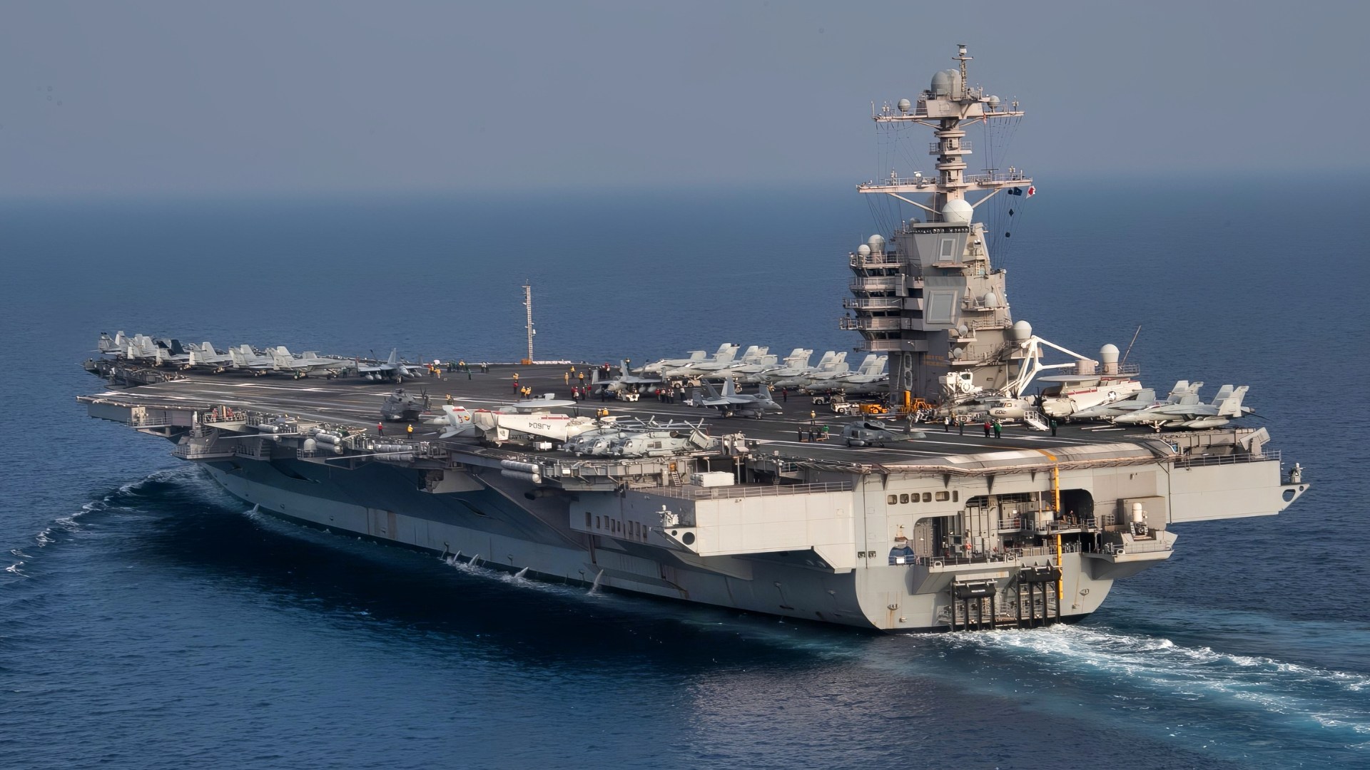 The world's largest aircraft carrier USS Gerald R. Ford (CVN 78) steams in the Adriatic Sea, June 23, 2023. Gerald R. Ford is the U.S. Navy's newest and most advanced aircraft carrier, representing a generational leap in the U.S. Navy's capacity to project power on a global scale. The Gerald R. Ford Carrier Strike Group is on a scheduled deployment in the U.S. Naval Forces Europe area of operations, employed by U.S. Sixth Fleet to defend U.S., allied, and partner interests. (U.S. Navy photo by Mass Communication Specialist 2nd Class Jackson Adkins)