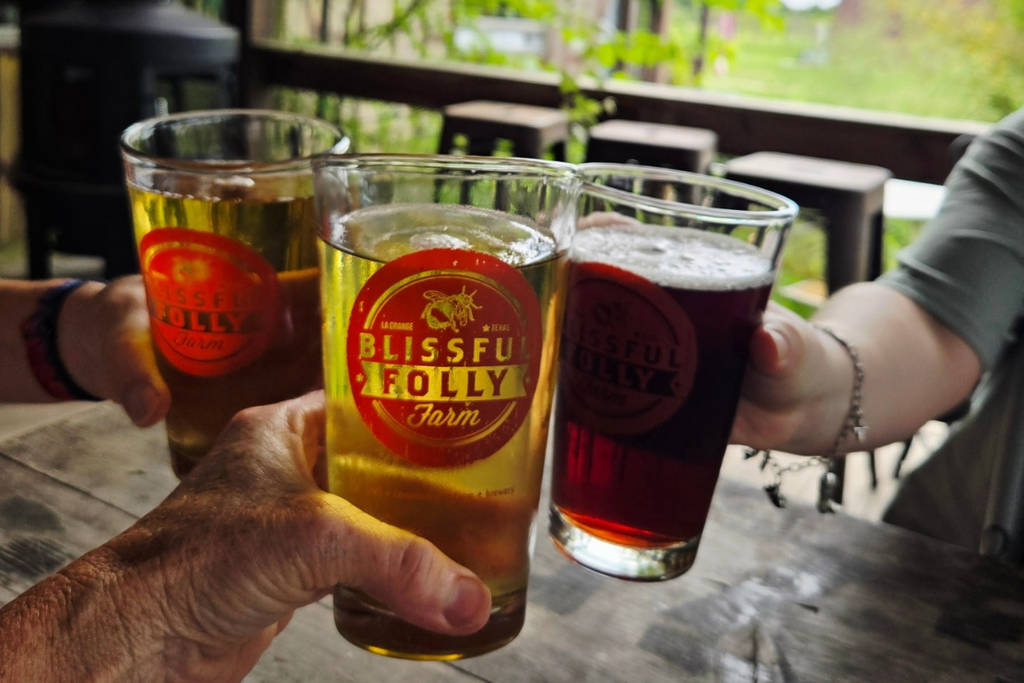 Image a trio of ciders at a brewery in La Grange.
