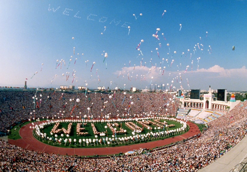 Some 1200 helium balloons are released into the air from the field of the Los Angeles...