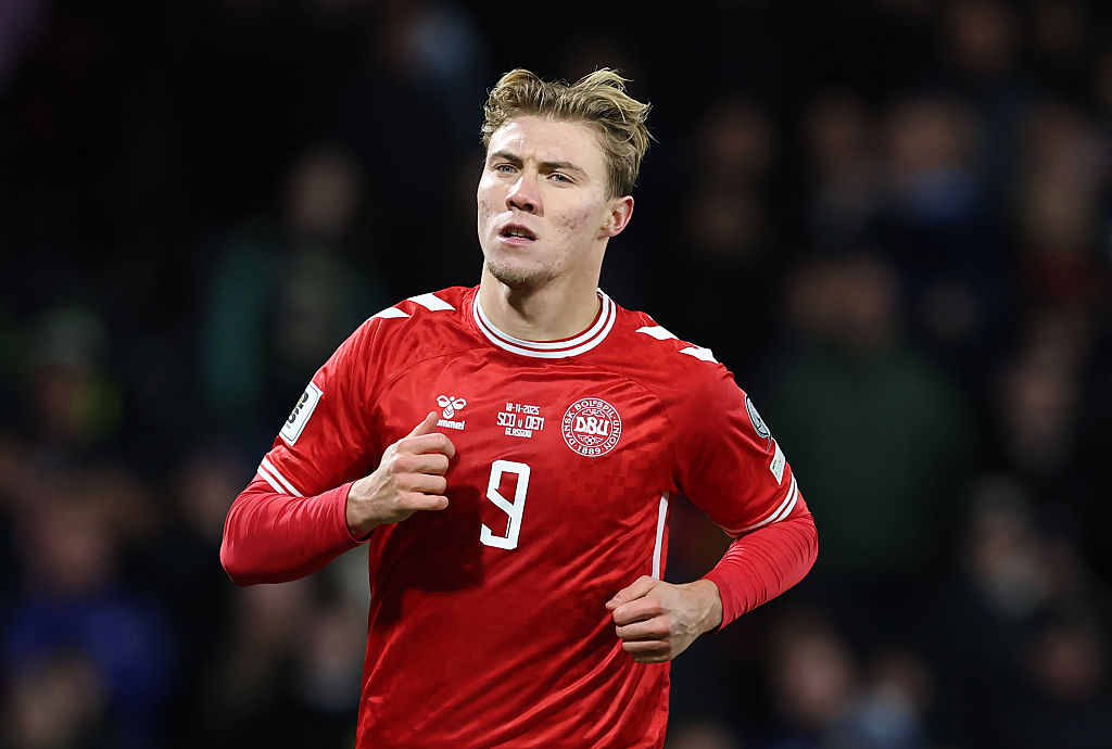 GLASGOW, SCOTLAND - NOVEMBER 18: Rasmus Hojlund of Denmark celebrates scoring his team's first goal with teammates during the FIFA World Cup 2026 qualifier match between Scotland and Denmark at Hampden Park on November 18, 2025 in Glasgow, Scotland. (Photo by Ian MacNicol/Getty Images)