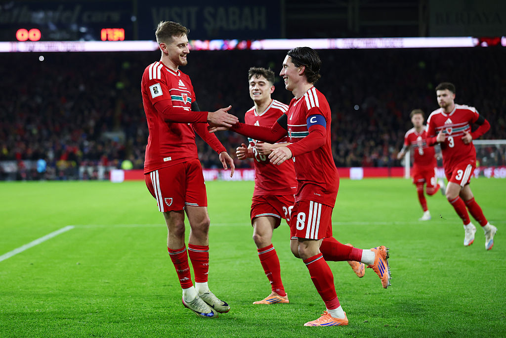 CARDIFF, WALES - NOVEMBER 18: Harry Wilson of Wales (R) celebrates scoring his team's first goal with teammate David Brooks during the FIFA World Cup 2026 qualifier match between Wales and North Macedonia at Cardiff City Stadium on November 18, 2025 in Cardiff, Wales. (Photo by Dan Istitene/Getty Images)
