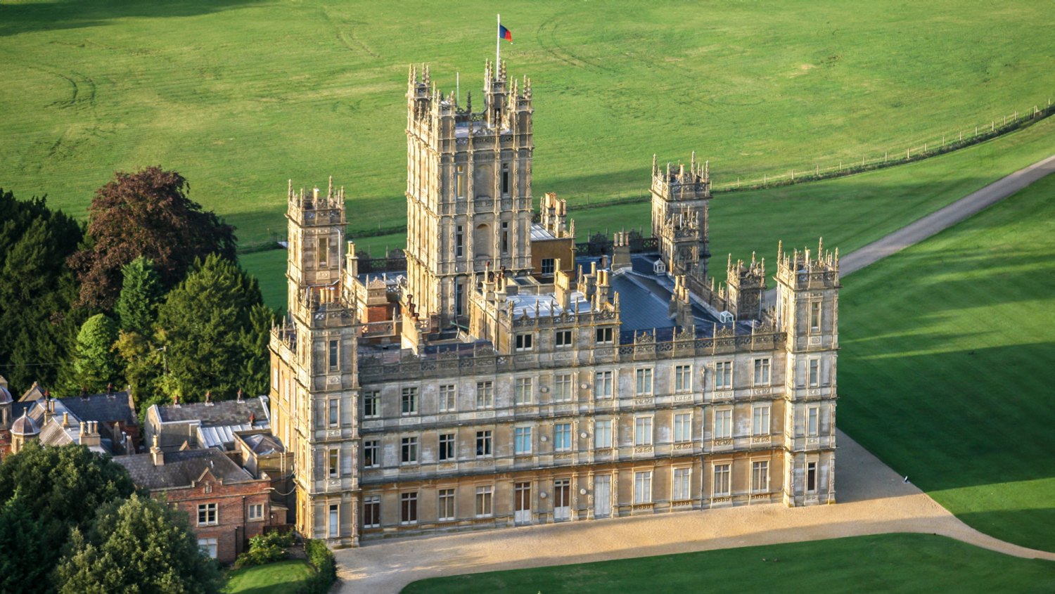 Aerial photograph of the Earl of Carnarvon's Highclere Castle, Hampshire HAMPSHIRE, UNITED KINGDOM. SEPTEMBER 05. Aerial photograph of Highclere Castle, the country seat of the Earl of Carnarvon on September 05 2010. This Jacobean style stately home was designed by Sir Charles Barry, it is located 6 miles south of Newbury. Highclere was also the location for the television programme Downton Abbey