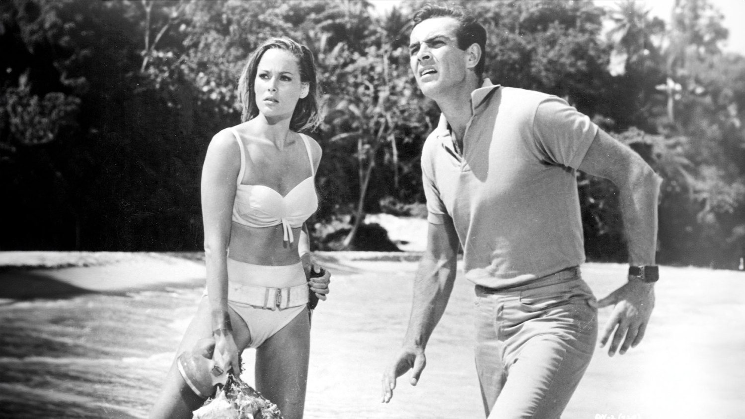 Dr. No Eon Prods. United Artists May 8, 1963 1963: Actors Ursula Andress and Sean Connery in a scene from Dr. No directed by Terence Young.