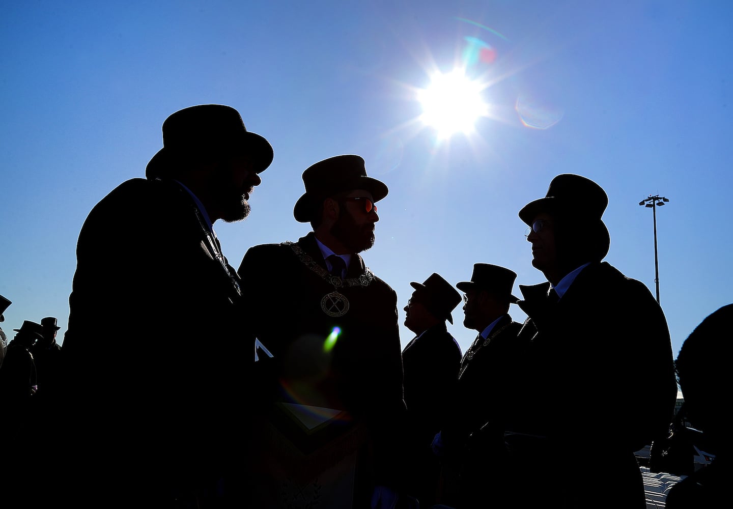 Members of the Grand Lodge of Masons in Boston chatted before a ceremony was held Saturday morning at the Conley Terminal.