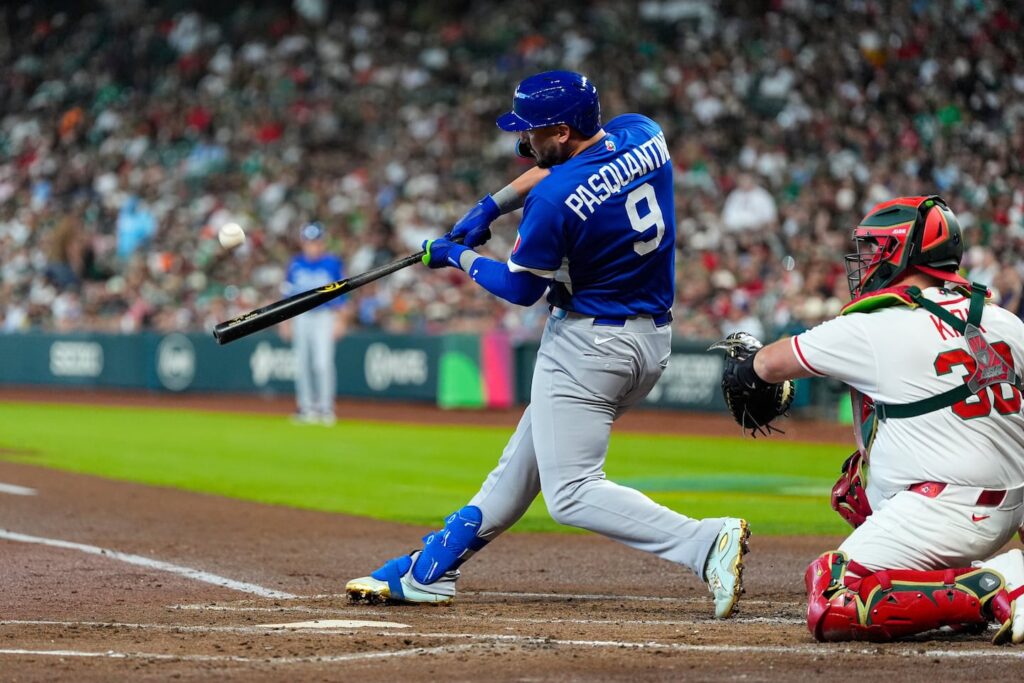 Italy first baseman Vinnie Pasquantino hits a home run in the second inning against Mexico, the first of three he hit in the game.