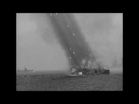 American Navy LSM(R) ships launch rockets at Japanese positions during BattleOfOkinawa - World War 2 (1945)