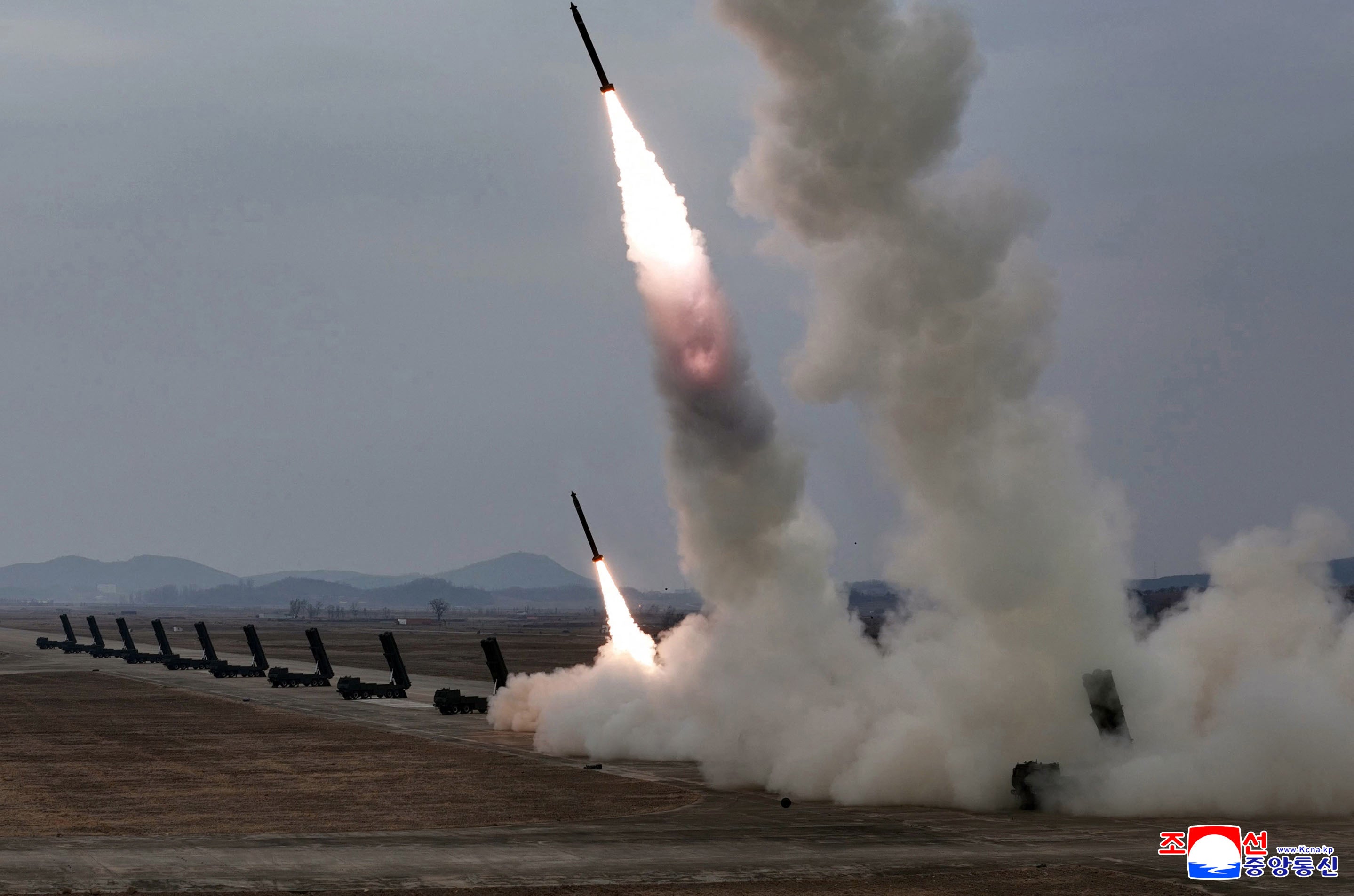 Pictures show a training exercise of North Korean Army's 600mm-calibre ultra-precision multiple rocket launchers, at an undisclosed location in North Korea