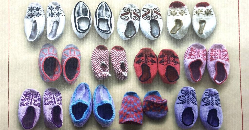 Rows of shoes from the front cover of