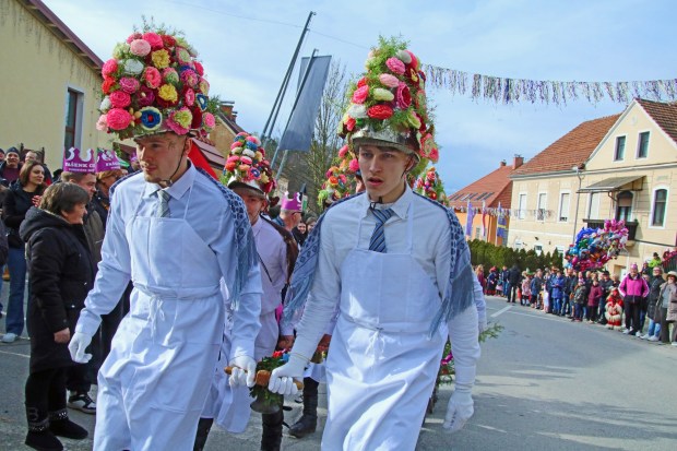 Traditional ploughmen are known for digging the first furrow of fields and making a magic circle around villages. These characters are in Cirkulane. (Photo by Norma Meyer)