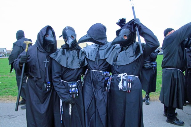 Black Death plague doctors join the fun at a carnival parade in Markovci, Slovenia. (Photo by Norma Meyer)