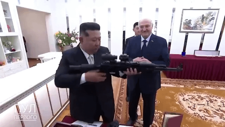 Belarus President Lukashenko gifts Kim Jong Un an automatic rifle during his visit North Korea