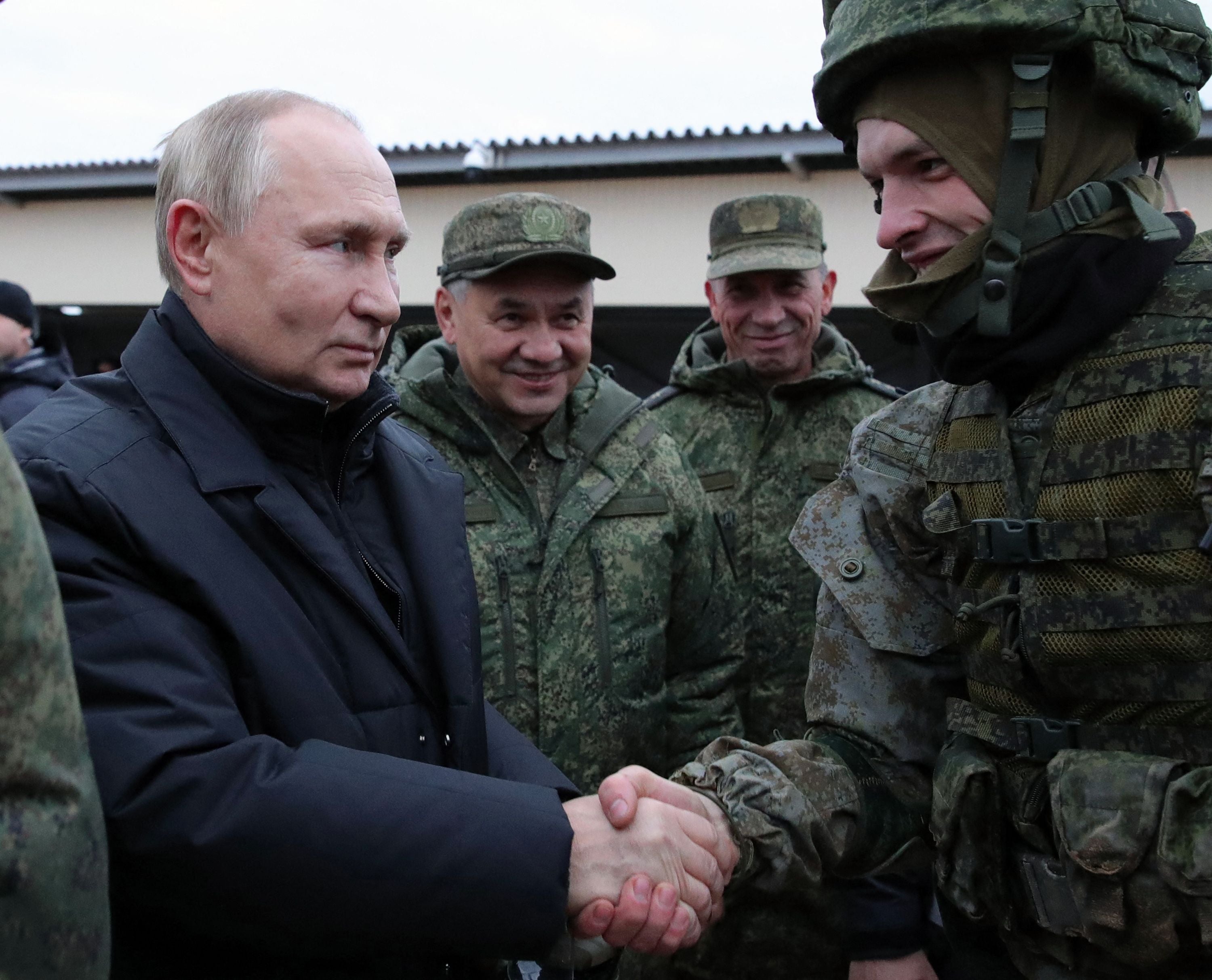 Vladimir Putin meet soldiers during a visit at a military training centre outside the town of Ryazan on October 20, 2022. Russia now has to offer huge financial incentives to get people to join up