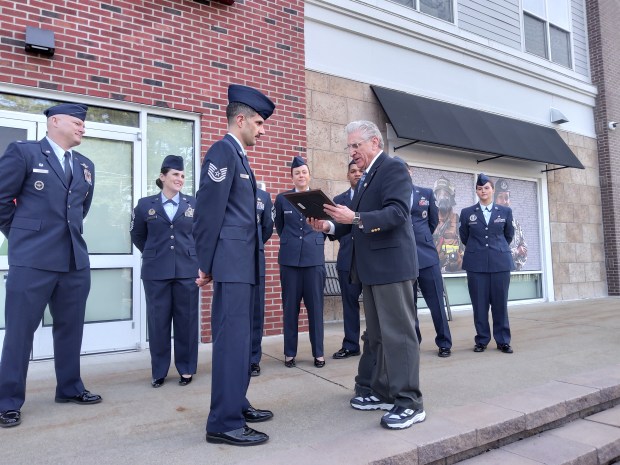 Senator Jim Tedisco presents a commendation to members of the US Air Force. (Melissa Schuman - MediaNews Group)